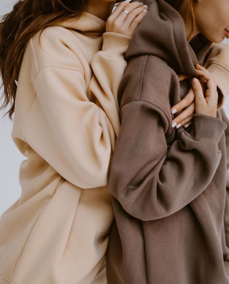 Soft oversized branded hoodies in neutral tones